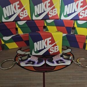 Nike SB pair of mini sneakers Keychain.